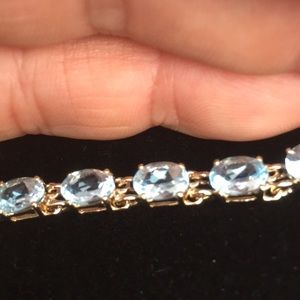 Genuine aquamarine tennis bracelet.